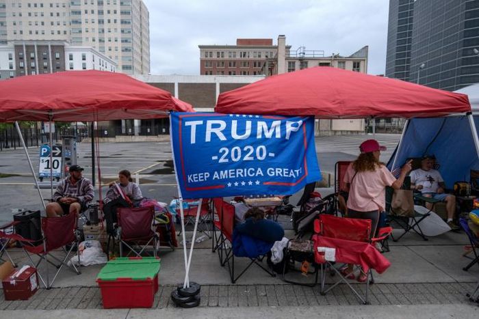 Diehard supporters of US President Donald Trump camp near the BOK Center in Tulsa, Oklahoma, ahead of Trump's rally
