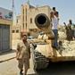 Forces of Libya's UN-recognised unity government patrol the town of Tarhuna, southeast of the Tripoli, after retaking it from fighters loyal to eastern-based strongman Khalifa Haftar