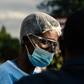 Doctors and nurses in Zimbabwe staged a walk-out in protest over a lack of protective clothing