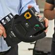 James W. Teetzel, CEO and founder of American defence manufacturer Wilcox, holds a medical ventilator at Qatar's Barzan facility, in the capital Doha