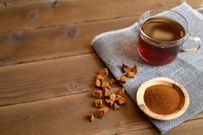 chaga tea mushroom from birch tree using for healing tea or coffee in folk medicine. ground powder