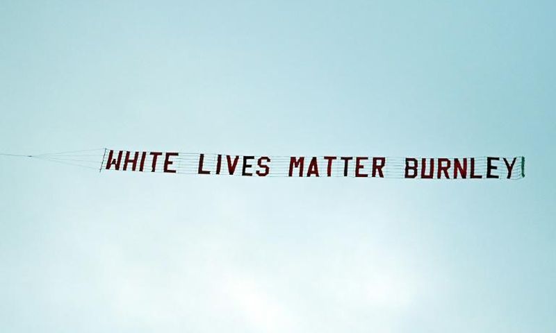 The start to Manchester City's Premier League match against Burnley on Monday was marred by a plane flying overhead with a banner reading "White lives matter Burnley"