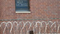 "Help we matter 2" written in a window at the Chicago Cook County Department of Corrections, housing one of largest US jails, amid a coronavirus outbreak among inmates and staff