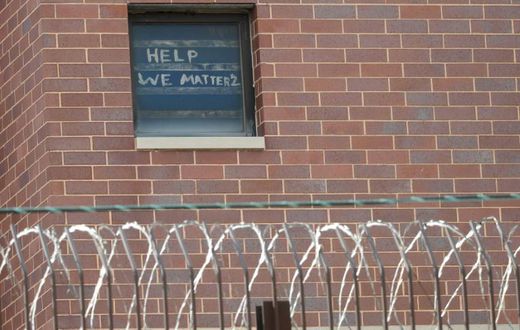 "Help we matter 2" written in a window at the Chicago Cook County Department of Corrections, housing one of largest US jails, amid a coronavirus outbreak among inmates and staff