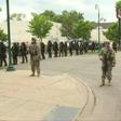IMAGES National Guard soldiers are deployed in Minneapolis for peacekeeping after a third night of rioting over police brutality against African Americans left hundreds of shops damaged and a police station on fire.