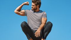 Get Liams Look: <a href=&quot;https://www.cosstores.com/en_usd/men/menswear/t-shirts/product.round-neck-t-shirt-blue.0164609104.html&quot; target=&quot;_blank&quot;>COS T-shirt</a>; <a href=&quot;https://www.outerknown.com/collections/pants/products/s-...