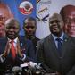 Vital Kamerhe, with the red tie, next to Felix Tshisekedi, right, during the 2018 election campaign