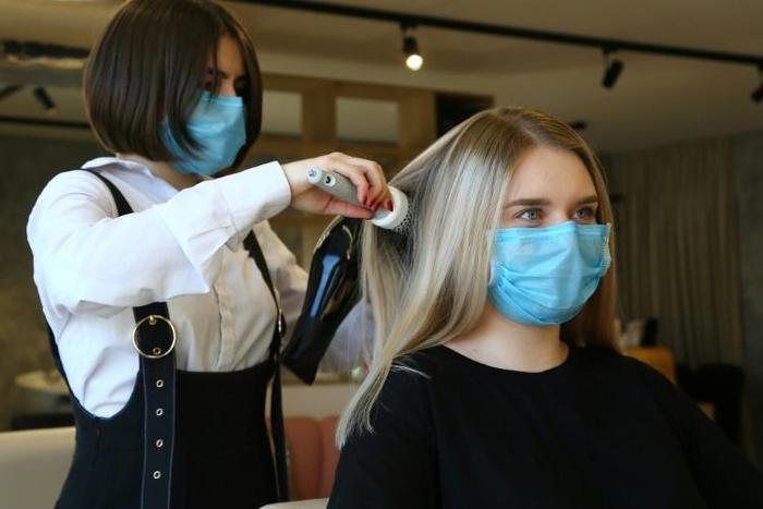 Russian small businesses such as this Vladivostok hairdresser have been struggling under coronavirus restrictions