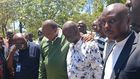 Former President Uhuru Kenyatta and Oburu Odinga at the grave of Raila Odinga in Bondo