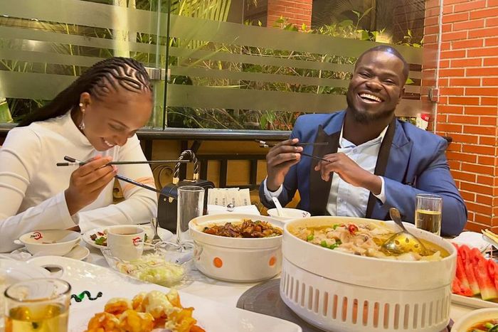 Mulamwah and Ruth K having a meal