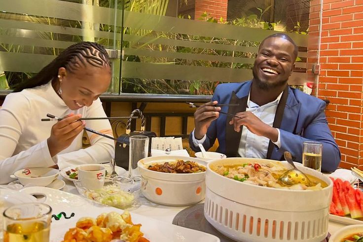 Mulamwah and Ruth K having a meal