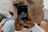 A photo of a person using TikTok