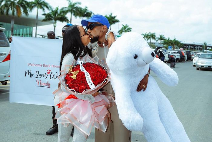 Singer Nandy with her husband, Billnass who gifted her a white Land Rover Defender on her 32nd birthday