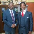 File image of Raila Odinga with Kasmuel McOure