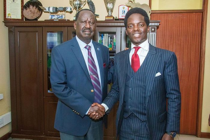 File image of Raila Odinga with Kasmuel McOure