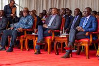 Former President Uhuru Kenyatta greeting President William Ruto during Ordination and Installation ceremony of Bishop Peter Kimani in Embu