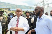 Haiti PM Garry Conille conducting an interview with CNN journalist Larry Madowo at the hospital.