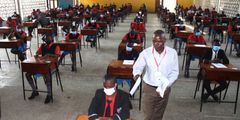 An invigilator invigilating KCSE exams