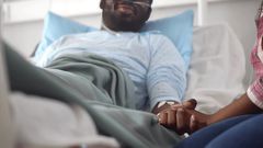 A stock photo of a person in hospital