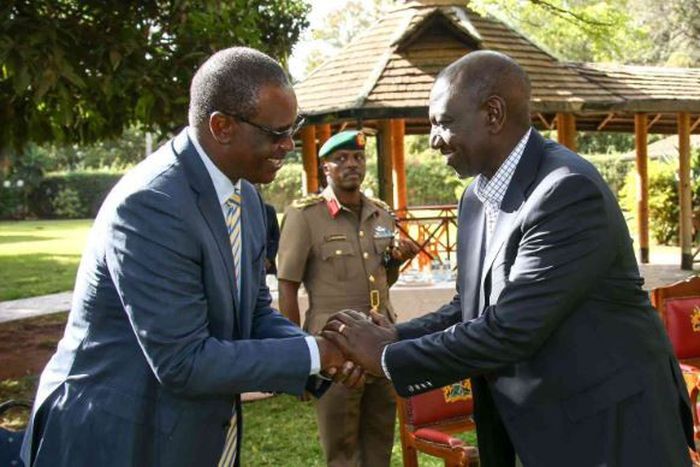 File image of President William Ruto with Evans Kidero