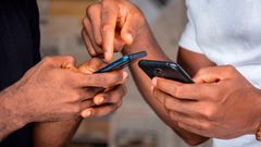 People using mobile phones