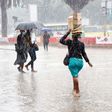 Kenyans bearing the rain in Nairobi CBD