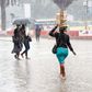 Kenyans bearing the rain in Nairobi CBD