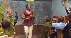 A teacher in a classroom in Kenya