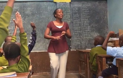 A teacher in a classroom in Kenya