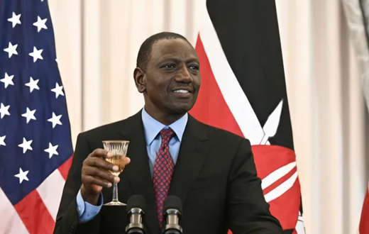 President William Ruto holds his glass for a toast during a luncheon in in Washington, DC, on May 24, 2024.