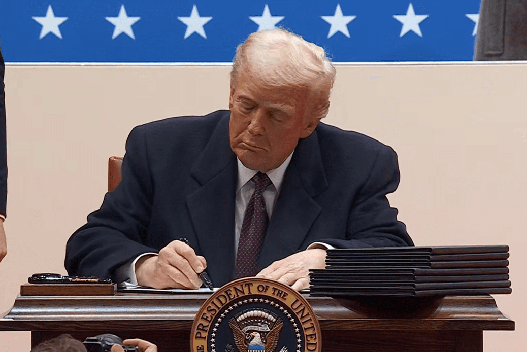 President Donald Trump signs several Executive Orders