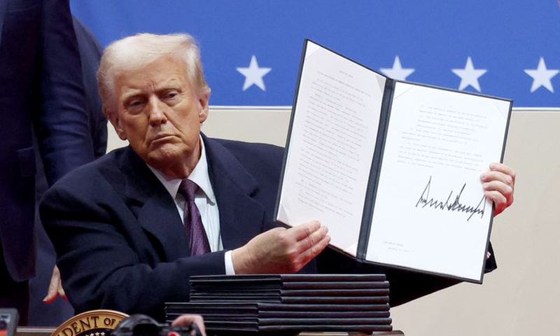 President Donald Trump signs several Executive Orders