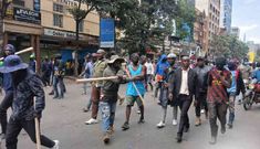 Armed goons pictured walking in the streets of Nairobi during protests earlier in June 2025