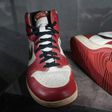 A pair of Michael Jordan's game-worn sneakers sold for $615,000, shattering a record set just months ago by the sale of another pair of the basketball legend's shoes
