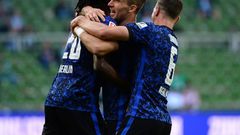 Hertha Berlin celebrate after defender Peter Pekarik (C) scores their opening goal at Werder Bremen