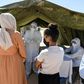 People queue to get tested for coronavirus at the field hospital in El Hamma. The town's hospital has no intensive care beds, and the army set up the field hospital in mid-August to bolster the local response and screen suspected cases