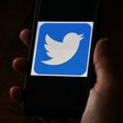 Twitter has said it is "investigating and taking steps" to fix a massive hack by scammers