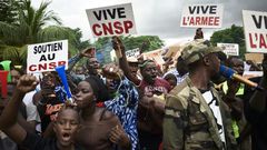 Supporters of the junta demonstrated while the officers conducted talks with the opposition