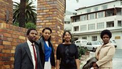 File picture from November 1985 at the height of the apartheid era: Winnie Madikizela-Mandela with her daughters Zenani, centre, and Zindzi, left, visiting Nelson Mandela after he underwent surgery in a Cape Town hospital