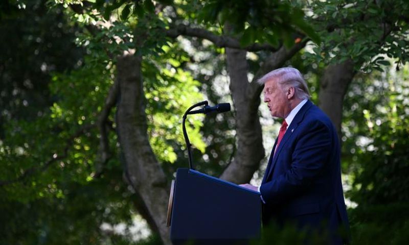 US President Donald Trump announces new action against China in a news conference in the Rose Garden of the White House