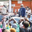 Former Prime Minister Raila Odinga and nominated MP Maina Kamanda during a tour of Burma Market, Nairobi