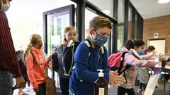 Students were masked as they headed back to class in Strasbourg, eastern France