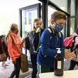 Students were masked as they headed back to class in Strasbourg, eastern France