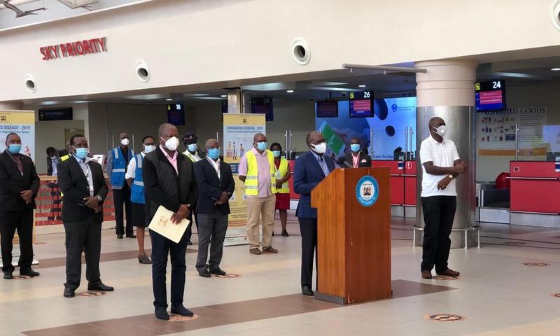 Health CS Mutahi Kagwe, Transport CS James Macharia and Ministry of Health Director General Patrick Amoth during a Covid-19 briefing from JKIA