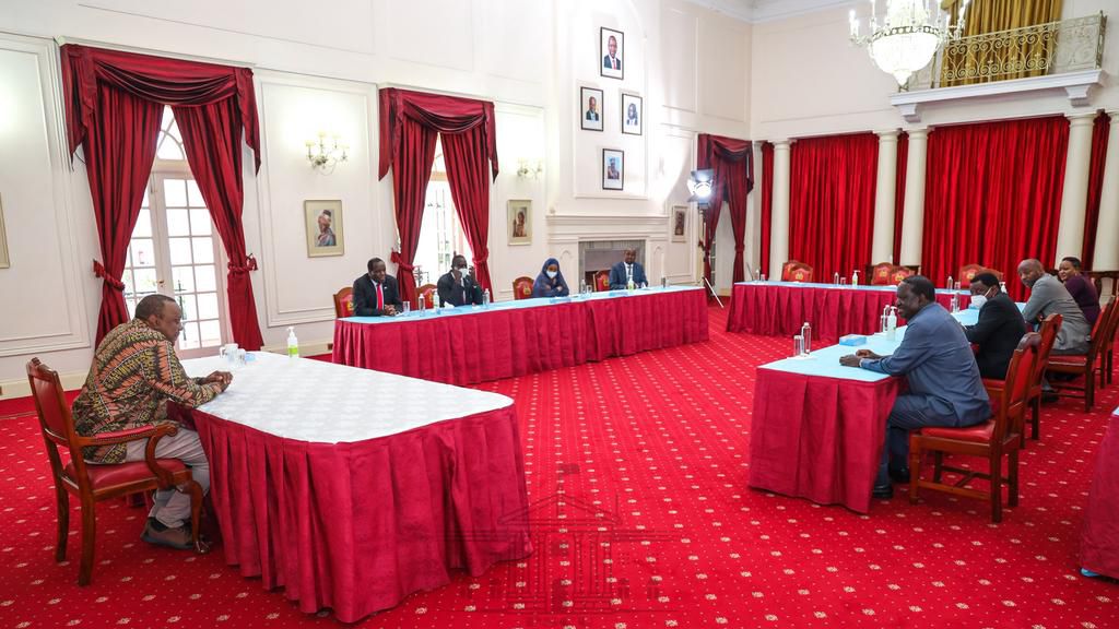 President Uhuru Kenyatta, handshake partner Raila Odinga, CoG Chair Wycliffe Oparanya and Senate leadership during a meeting at State House, Nairobi