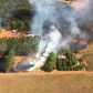 Handout picture released by the Mato Grosso State Fire Department showing an aerial view of forest fire at the Pantanal region, Mato Grosso state, Brazil