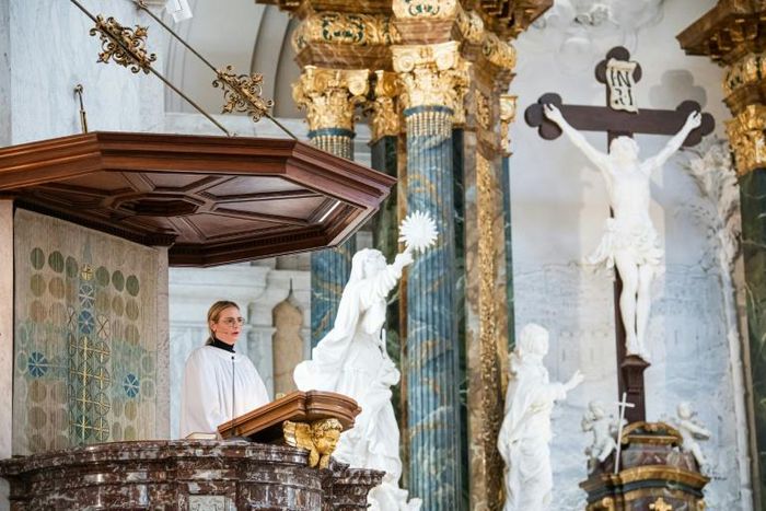 Theology student Julia Svensson preaches from the pulpit, something Anna Howard Shaw was denied in 1911