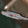 This handout satellite image obtained courtesy of  Maxar Technologies shows a mockup aircraft carrier being prepared in the Iranian port of Bandar Abbas on February 15