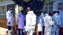 Crime scene investigators at the home where Lawrence Simon Warunge Njoroge murdered 4 family members and a mason on January 5, 2021