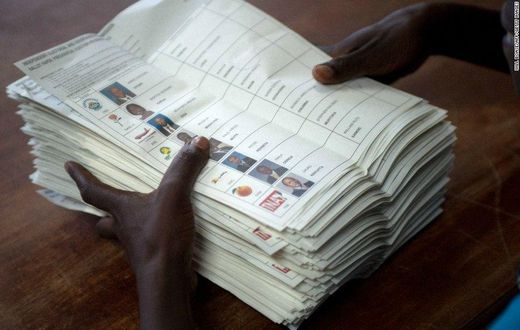___7579760___2017___11___10___9___A+voting+assistant+stacks+ballot+papers+marked+with+a+vote+for+presidential+candidate+Raila+Odinga+to